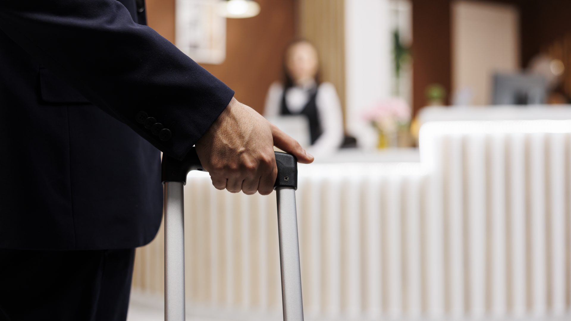 Businessman arriving in hotel lobby