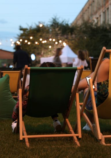 Modern open air cinema with comfortable seats in public park